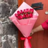 ramo de una vista con 12 rosas rojas